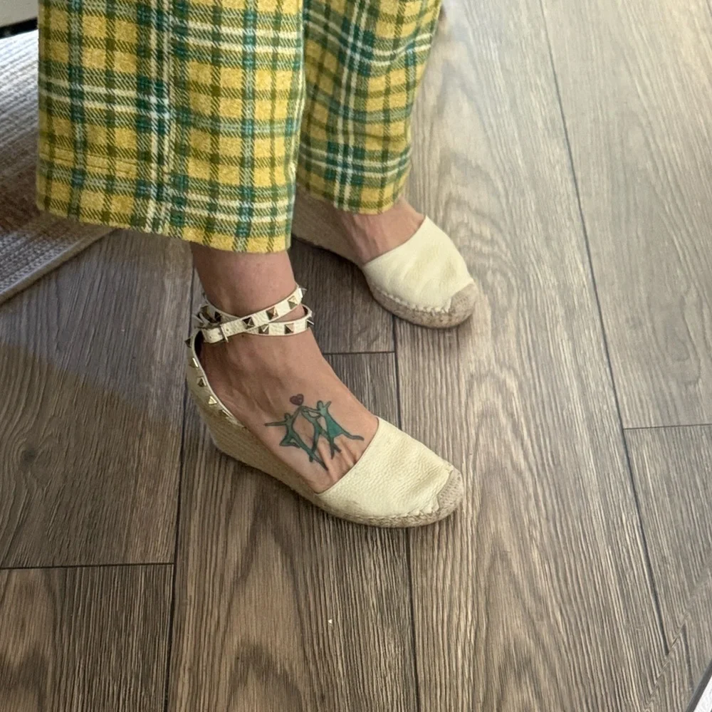 These are Valentino Garavani Rockstud textured-leather espadrille wedge heel